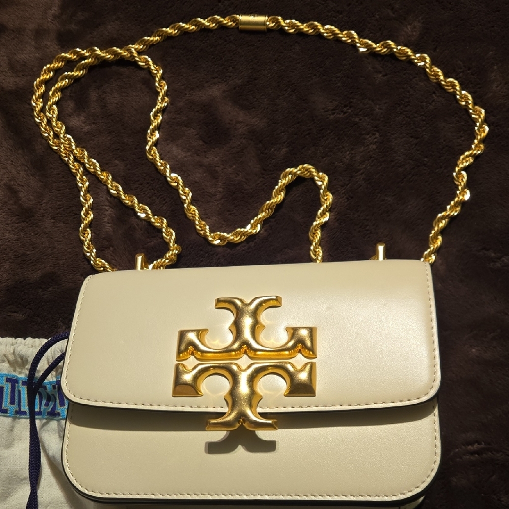 Elegant Cream Crossbody Bag with Gold Accents